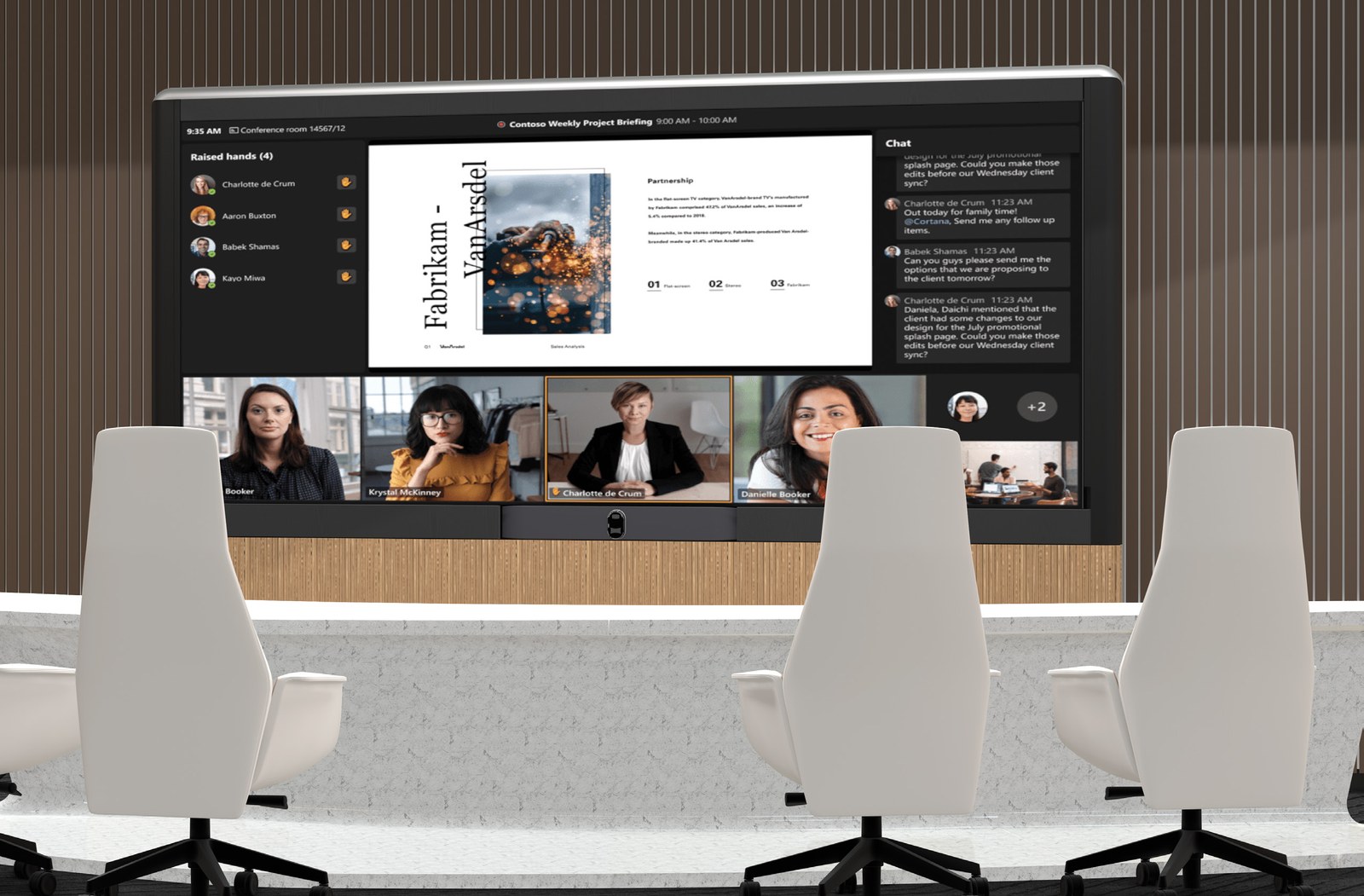 VisionHub mounted on a wood-panelled wall in a boardroom with white chairs in front